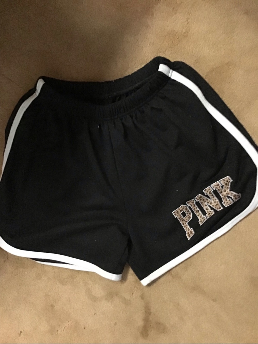 SHEIN Black Athletic Shorts with White Trim and Leopard Logo